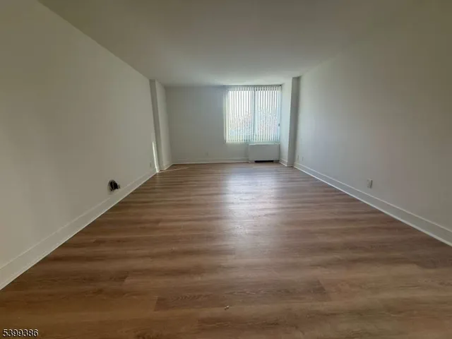 a bathroom with a granite countertop sink mirror and double