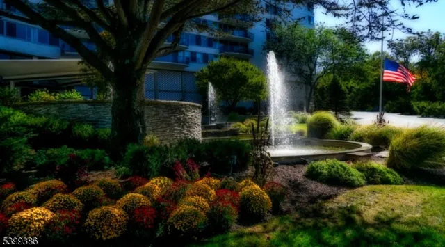 a view of a livingroom with furniture and a window