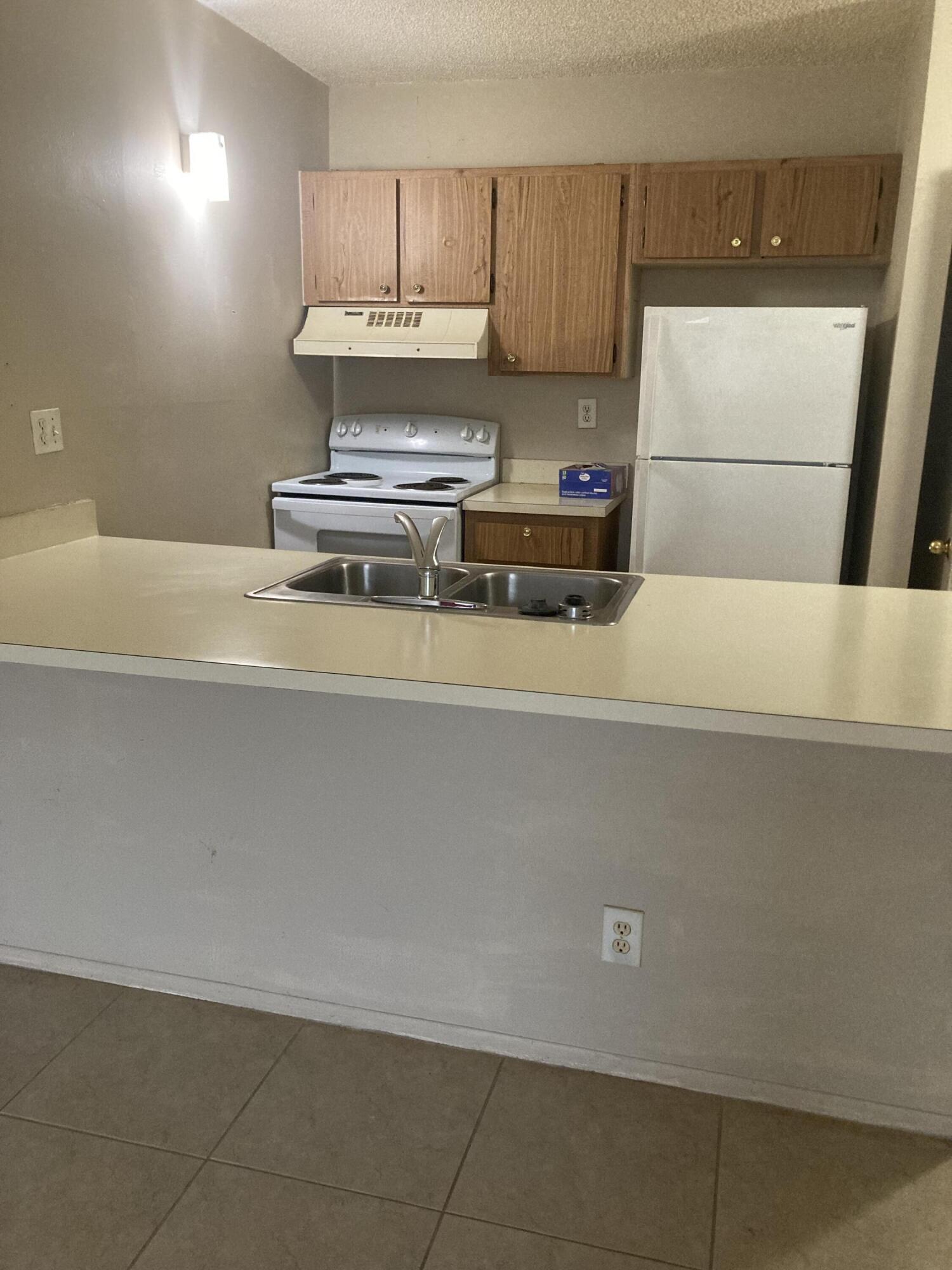 2501 Riverside Drive, Unit 110A Coral Springs, FL 33065 - Photo 4 of 14 IMG_0188