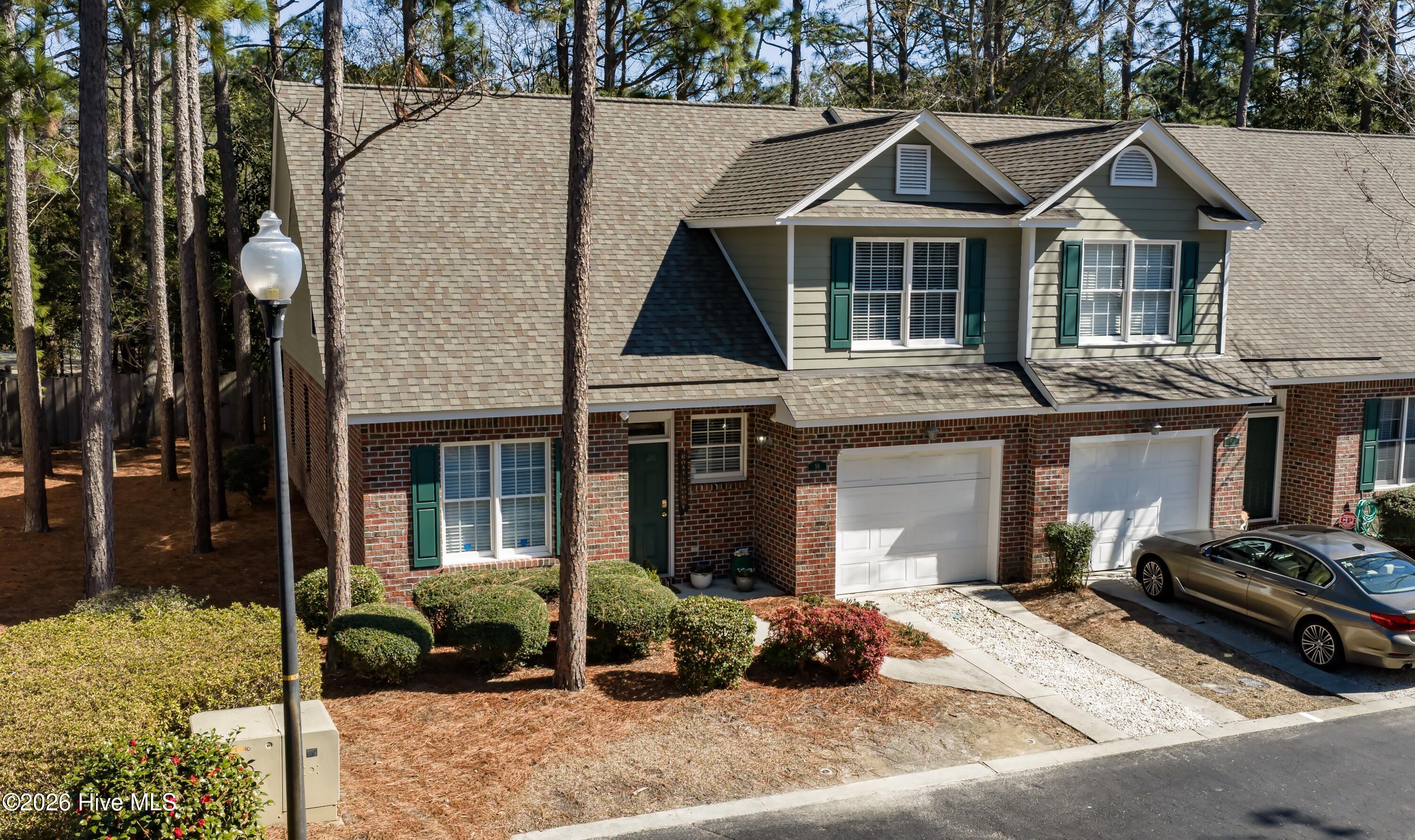 233 Racine Drive, Unit 59 Wilmington, NC 28403 - Photo 1 of 38 001_dji_20260223111103_0031_d_773