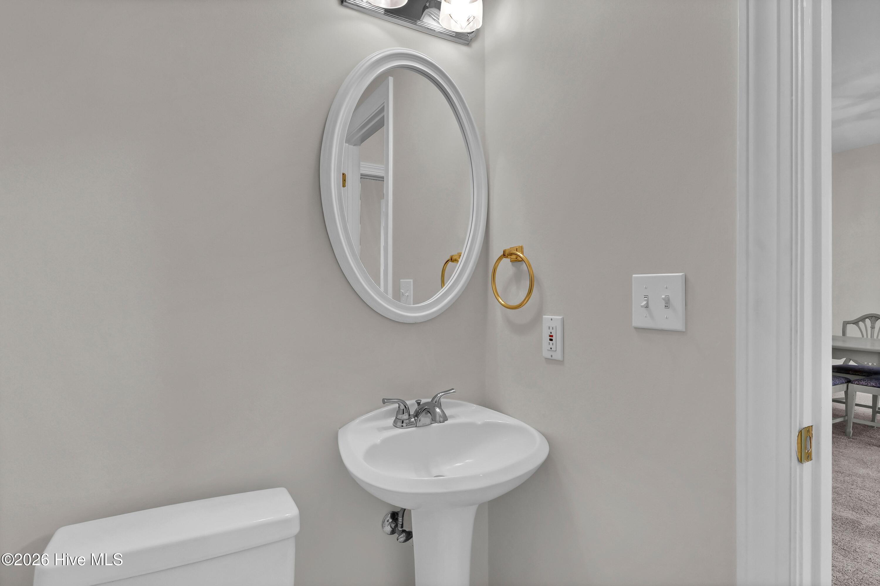 233 Racine Drive, Unit 59 Wilmington, NC 28403 - Photo 14 of 38 Convenient first floor powder room.