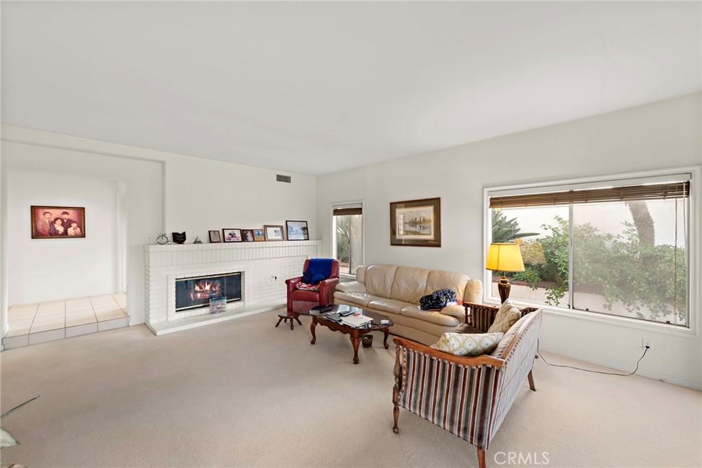 4 Charmony Laguna Niguel, CA 92677 - Photo 22 of 35 Family Room with Fireplace