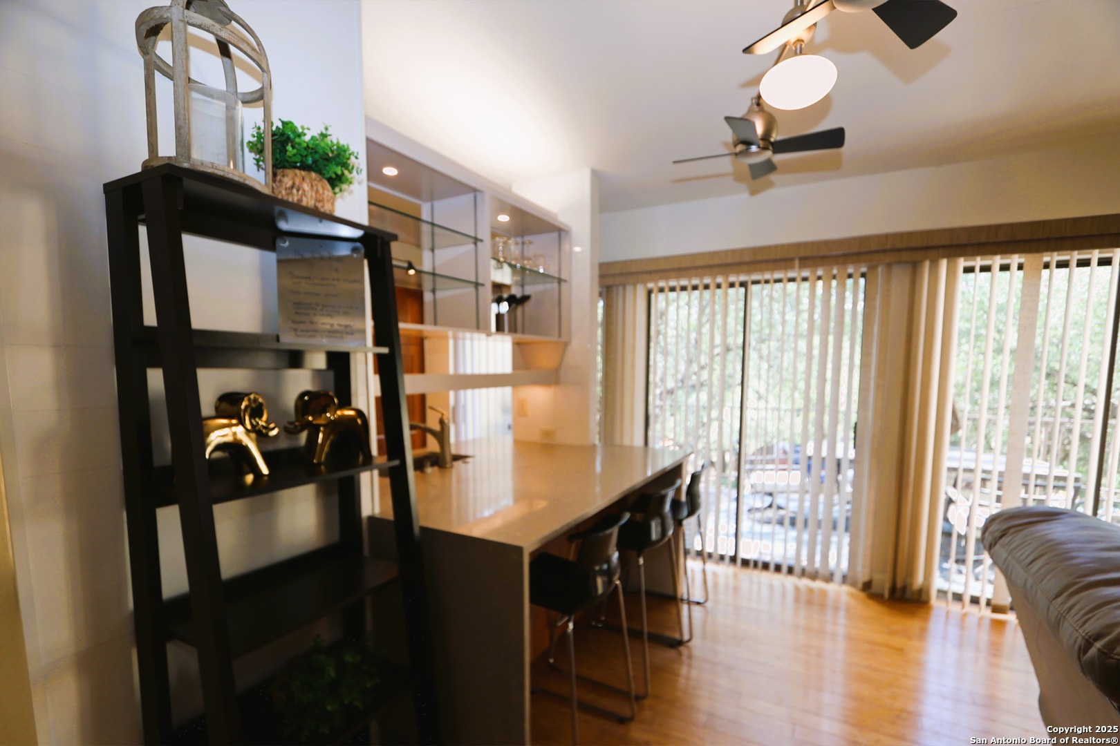 8642 Fredericksburg Road, Unit 402 San Antonio, TX 78240 - Photo 10 of 28 a view of a livingroom with furniture and hardwood floor