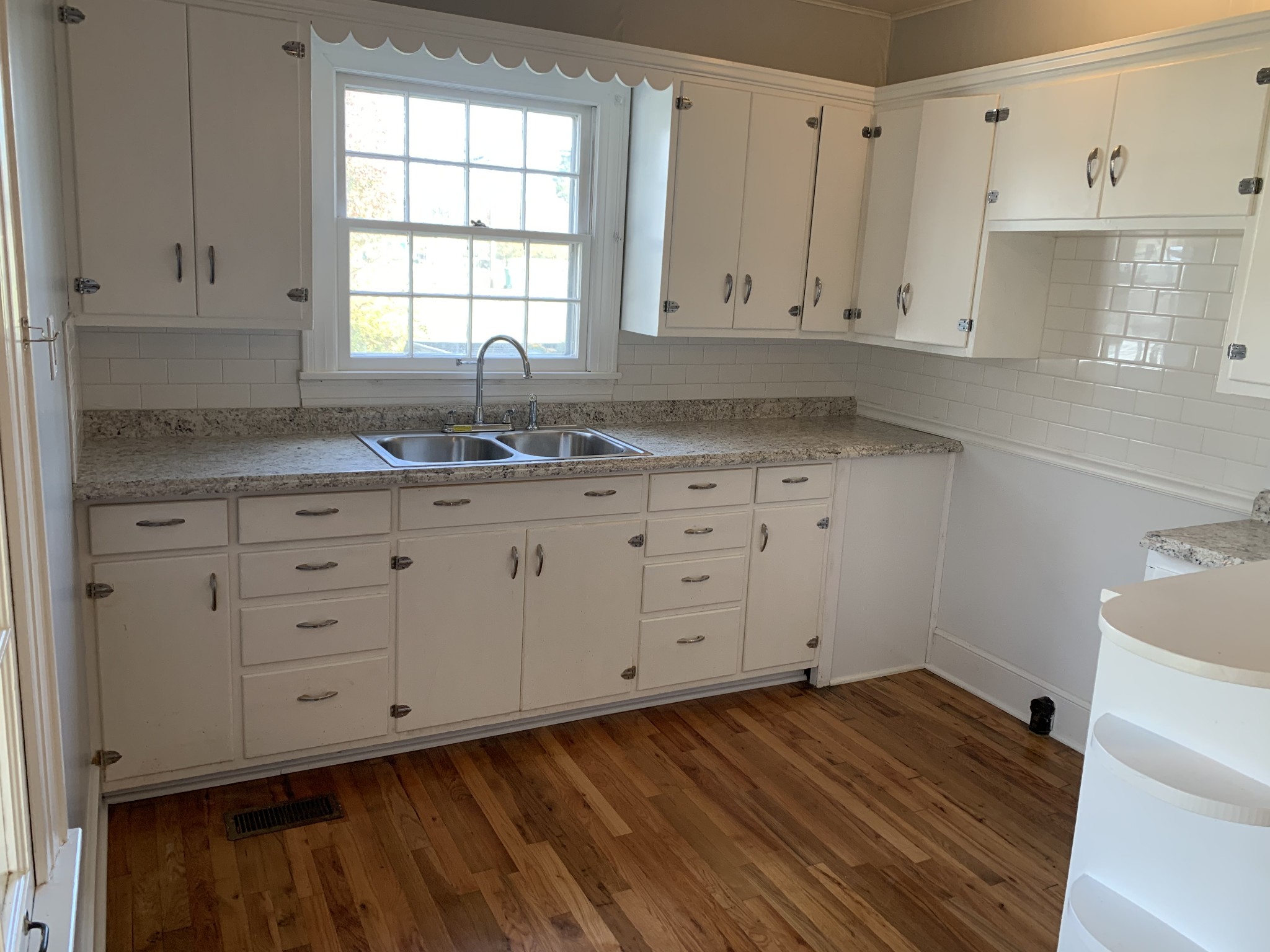 320 Franklin Road Lebanon, TN 37087 - Photo 11 of 19 a kitchen with granite countertop white cabinets and a sink