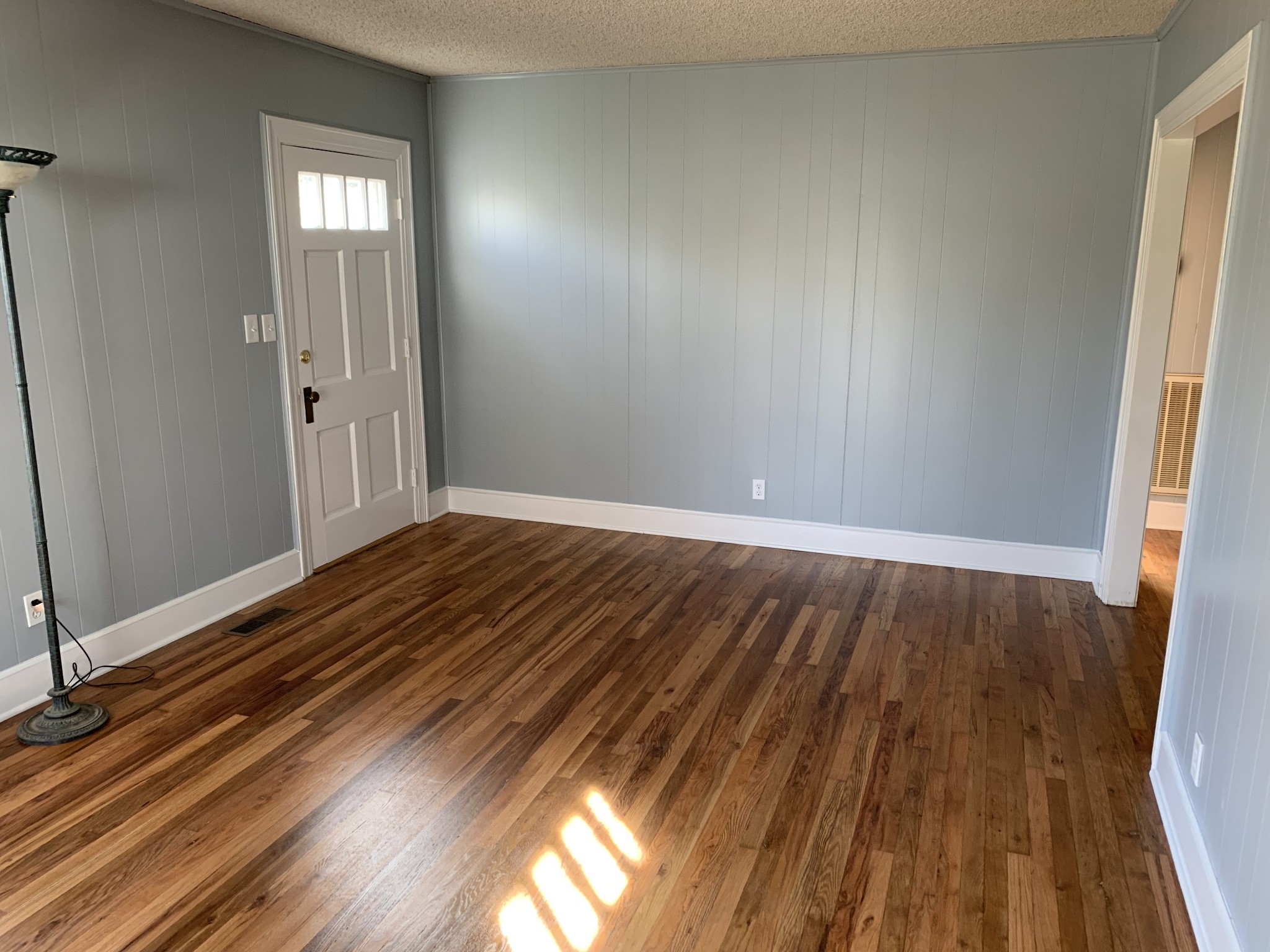 320 Franklin Road Lebanon, TN 37087 - Photo 8 of 19 wooden floor in an empty room with a window