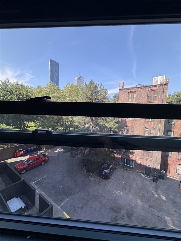 400 Massachusetts Avenue, Unit 34 Boston, MA 02115 - Photo 19 of 24 a view of a lake from a window