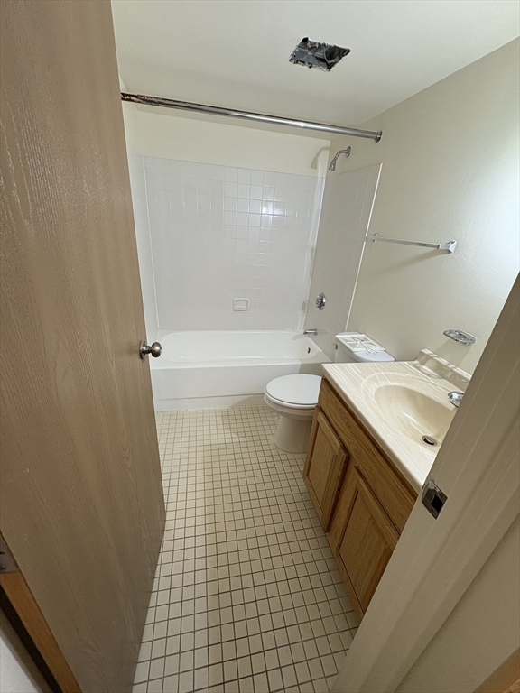 400 Massachusetts Avenue, Unit 34 Boston, MA 02115 - Photo 23 of 24 a bathroom with a sink a toilet and shower