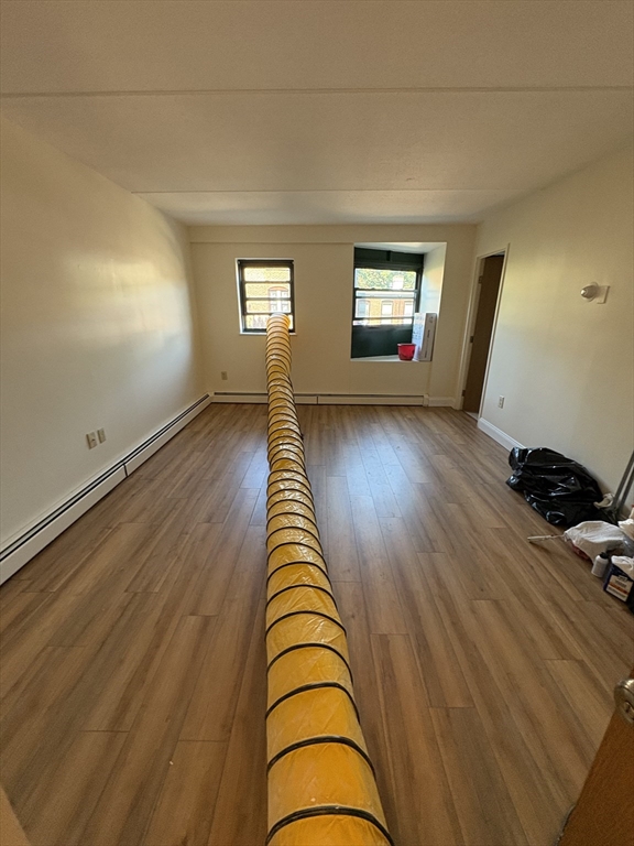 400 Massachusetts Avenue, Unit 34 Boston, MA 02115 - Photo 10 of 24 a view of empty room with windows