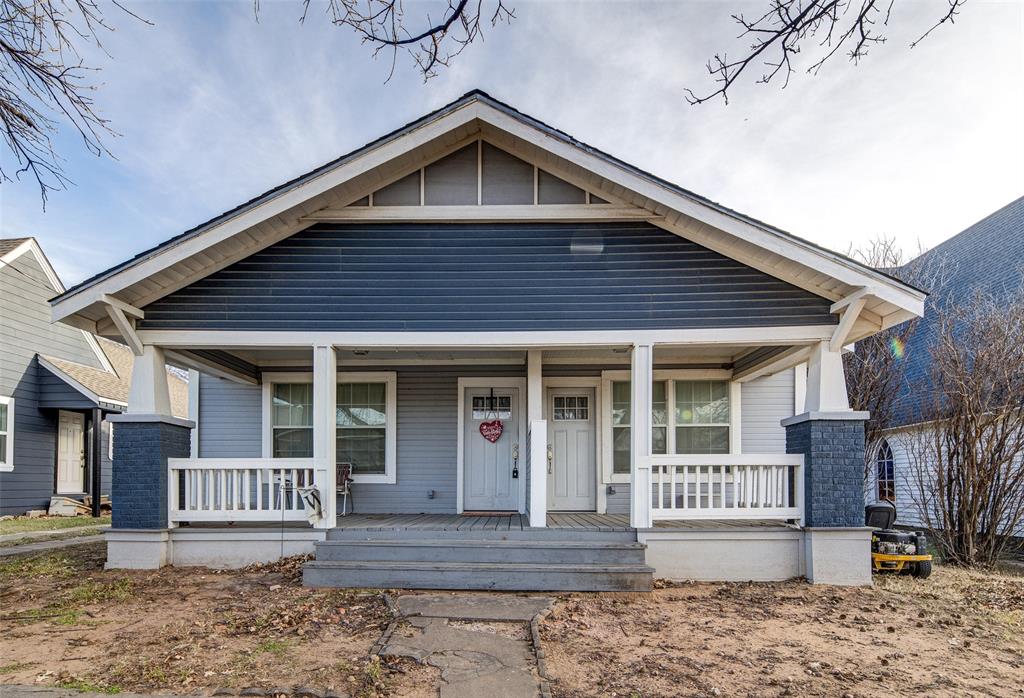 a front view of a house with a porch