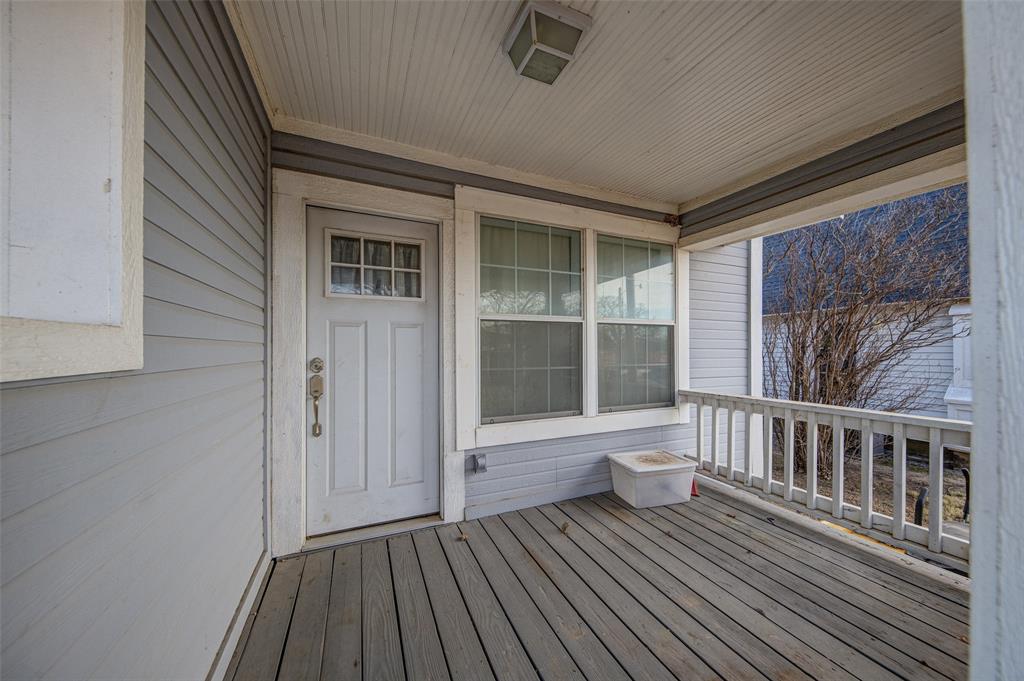 308 Cooke Street Nocona, TX 76255 - Photo 21 of 22 a view of a house with a porch