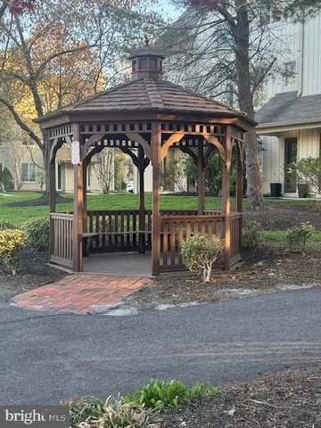 a view of park with wooden fence