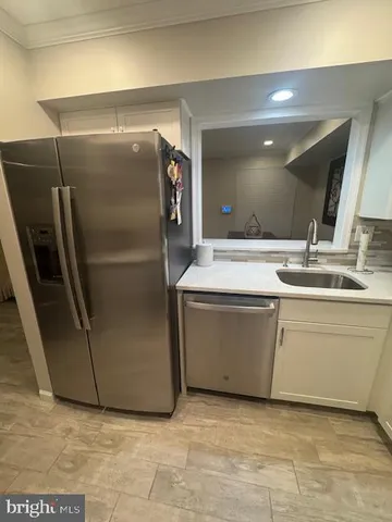 a utility room with washer and dryer