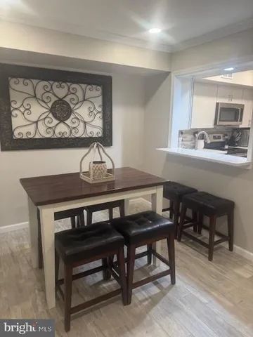 a view of a dining room with furniture