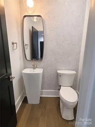 a bathroom with a toilet and a sink
