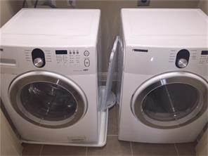1824 Wichita Street, Unit B Houston, TX 77004 - Photo 17 of 18 a utility room with dryer and washer