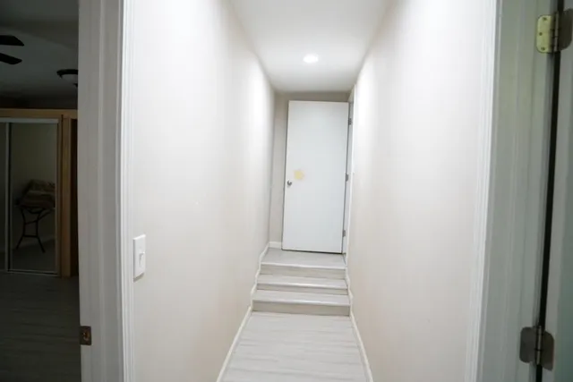 a view of a wooden house with a entertaining space