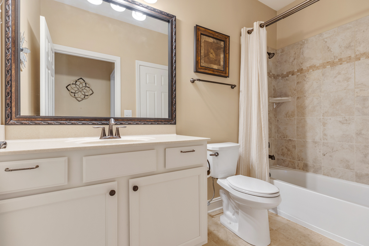 1093 Glendale Road Pingree Grove, IL 60140 - Photo 15 of 28 a bathroom with a sink a toilet and a bathtub