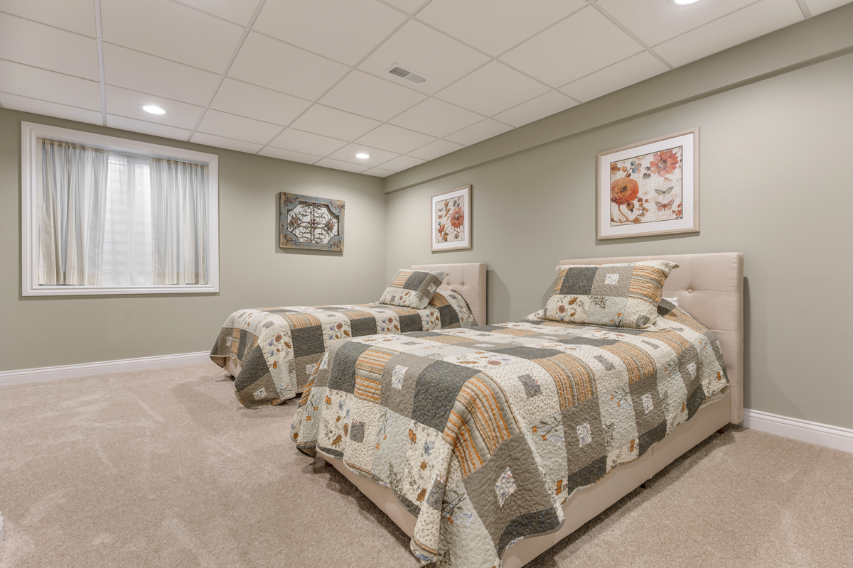 1093 Glendale Road Pingree Grove, IL 60140 - Photo 22 of 28 a spacious bedroom with two beds and a window