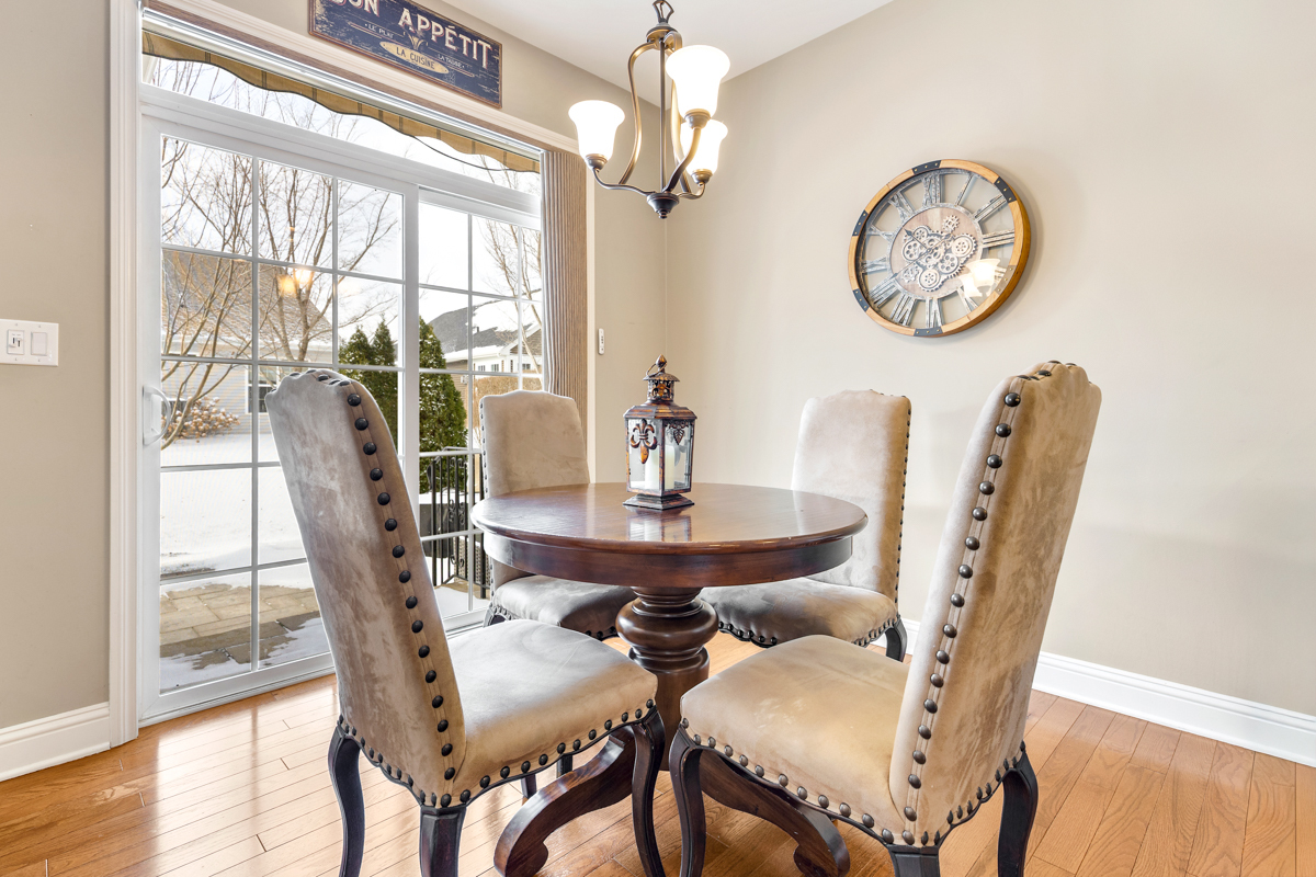 1093 Glendale Road Pingree Grove, IL 60140 - Photo 7 of 28 a view of a dining room with furniture window and wooden floor