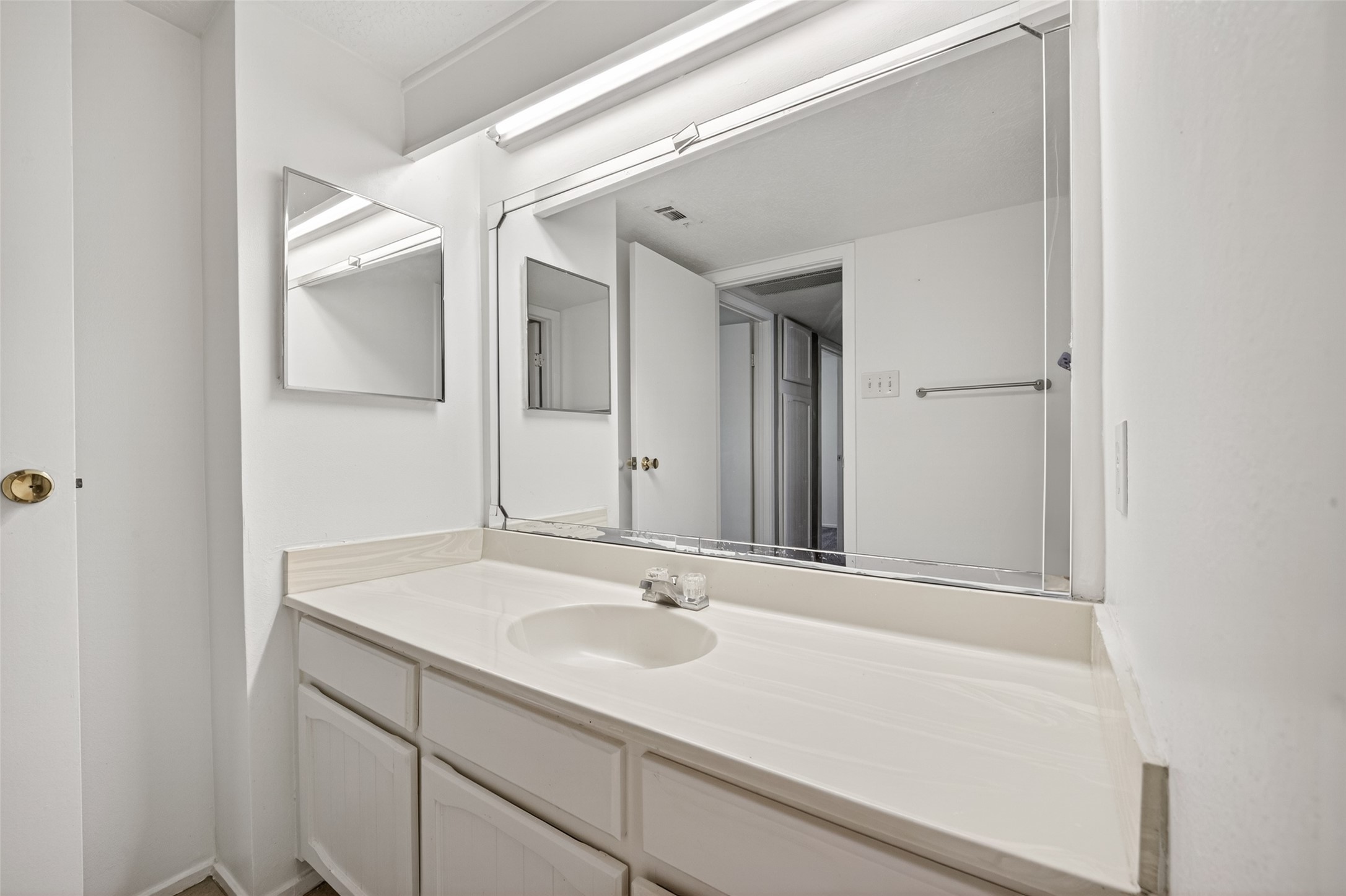 1106 East Red Cedar Circle Spring, TX 77380 - Photo 29 of 43 a bathroom with a sink and a mirror