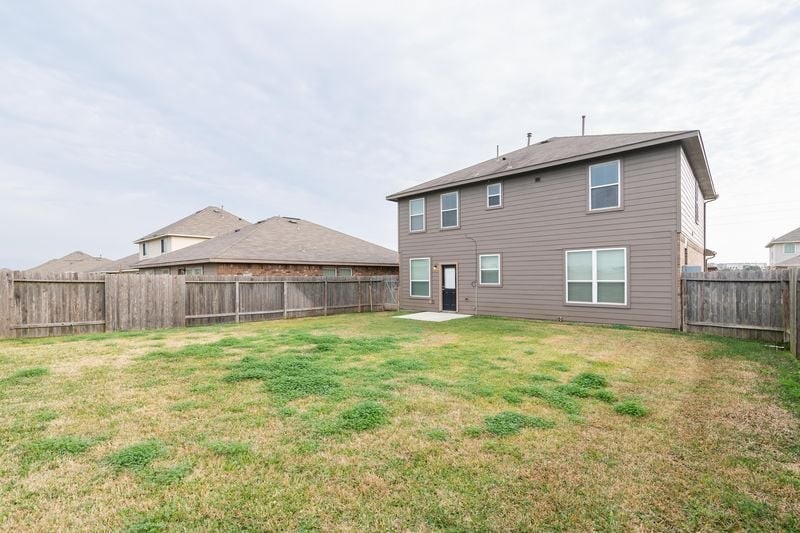 47 Santa Barbara Drive Manvel, TX 77578 - Photo 2 of 15 a view of a house with a yard and garage