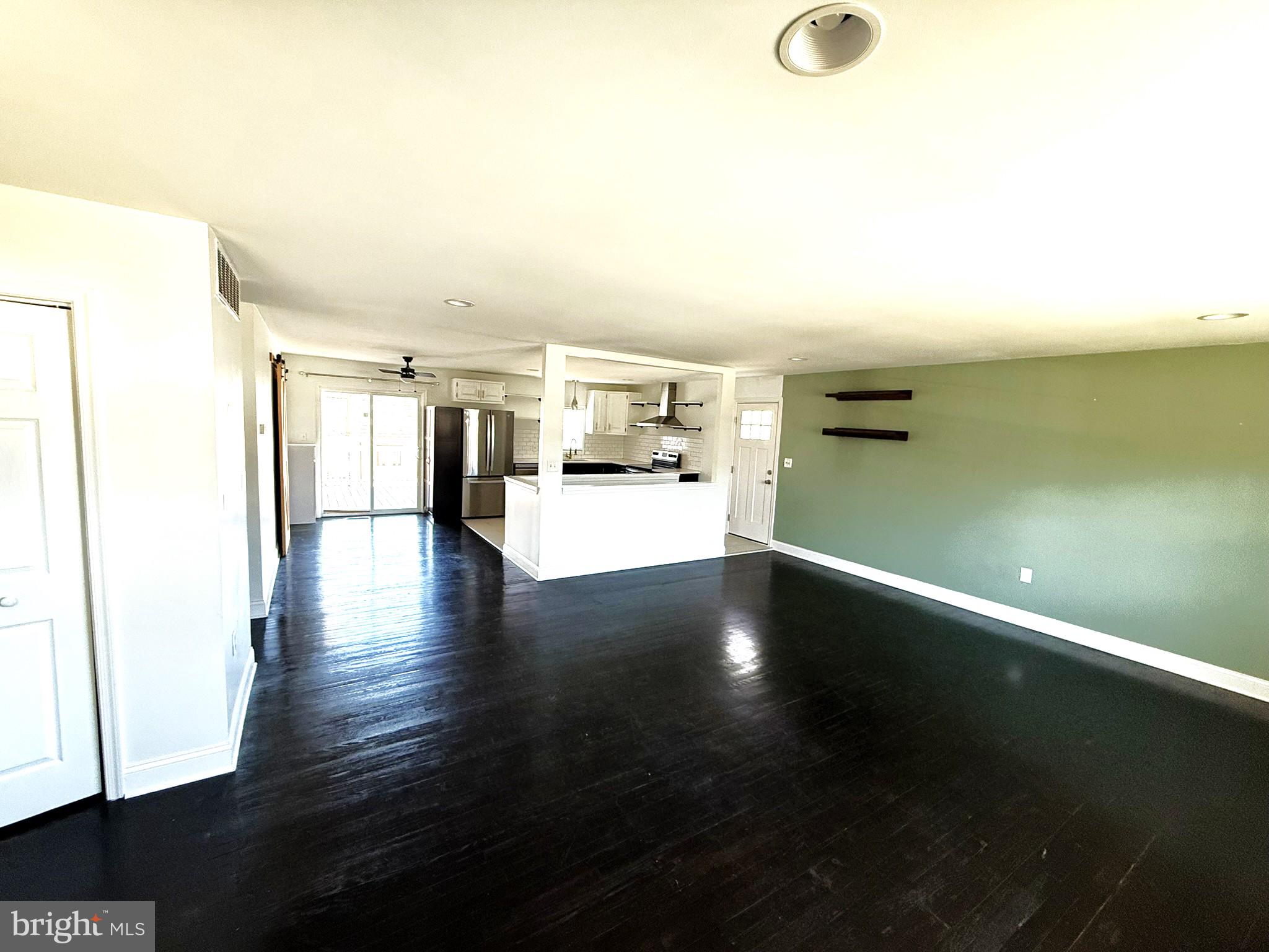 240 Federalsburg South Laurel, MD 20724 - Photo 11 of 36 a view of a kitchen with a sink and dishwasher with wooden floor