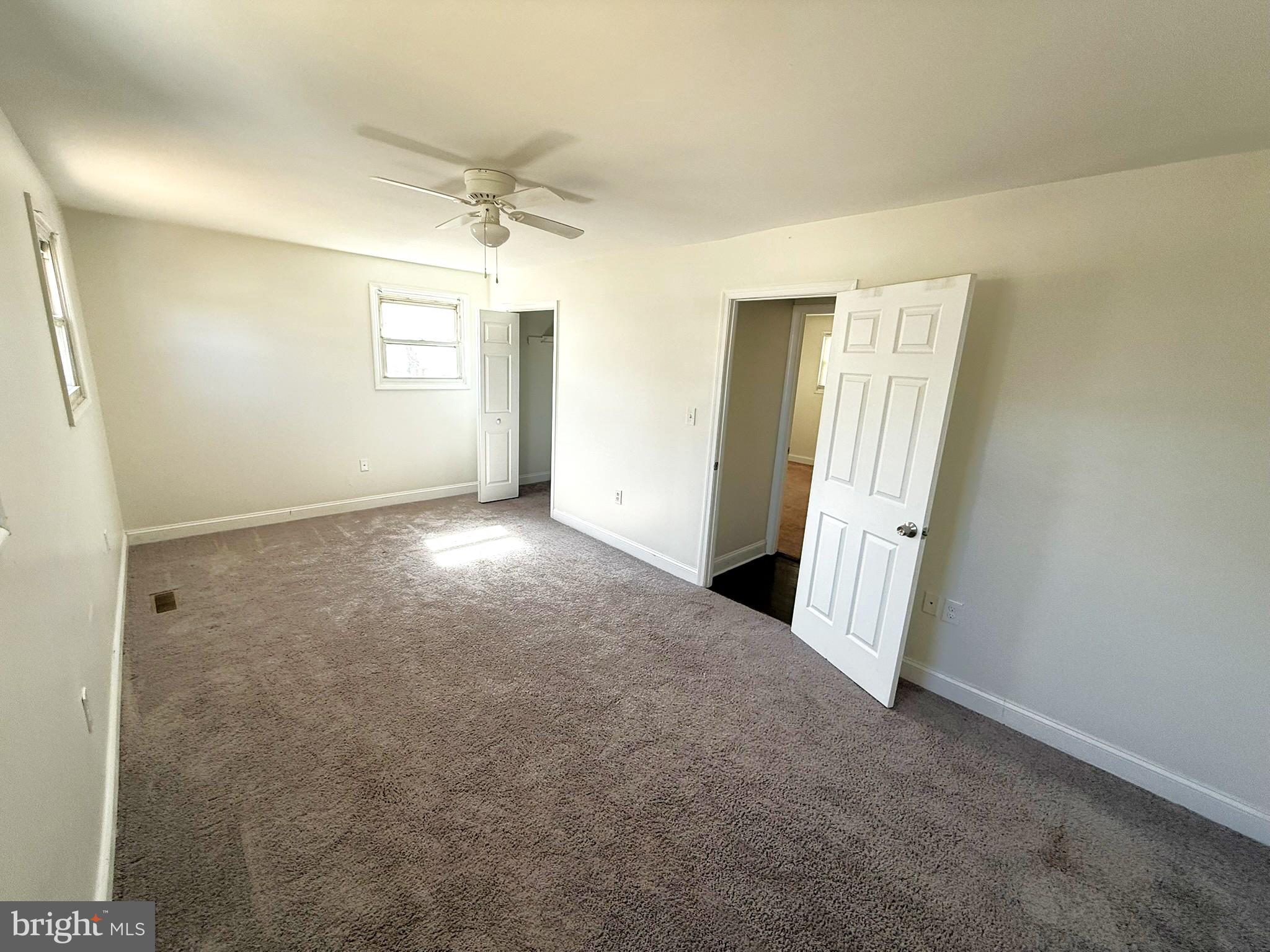 240 Federalsburg South Laurel, MD 20724 - Photo 21 of 36 an empty room with windows and cabinet