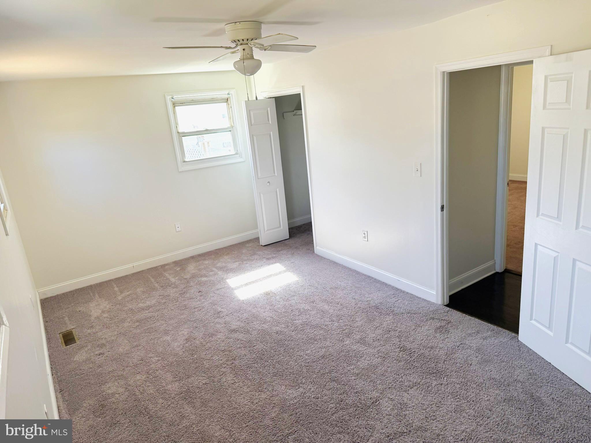 240 Federalsburg South Laurel, MD 20724 - Photo 22 of 36 an empty room with windows and refrigerator