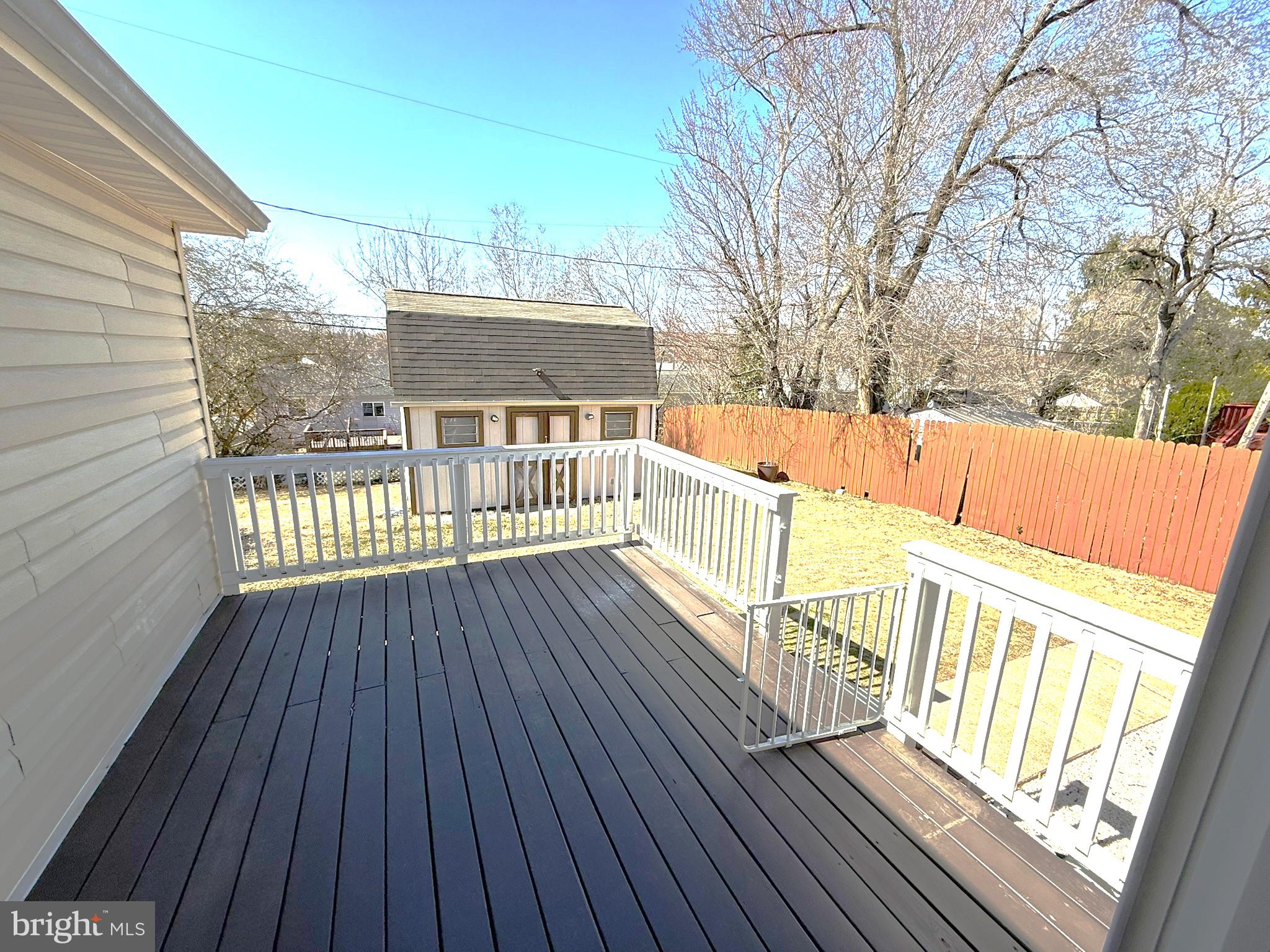 240 Federalsburg South Laurel, MD 20724 - Photo 8 of 36 a view of deck with wooden floor and fence