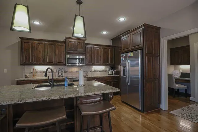 $585,000 | 1696 Northeast Parkwood Drive, Lee's Summit, MO 64064