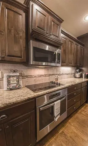 $585,000 | 1696 Northeast Parkwood Drive, Lee's Summit, MO 64064