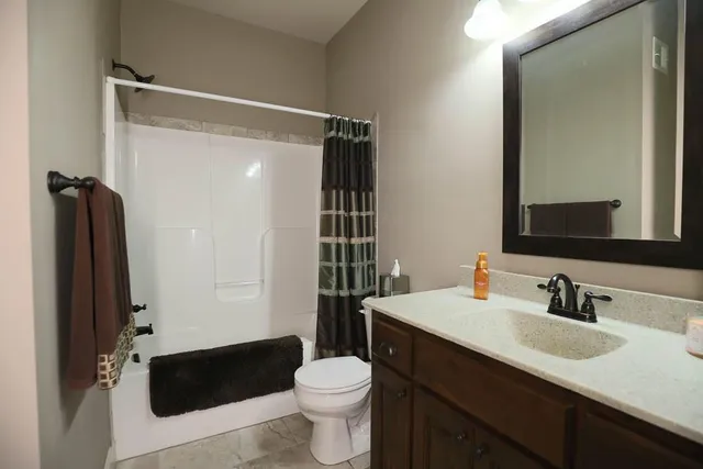 $585,000 | 1696 Northeast Parkwood Drive, Lee's Summit, MO 64064