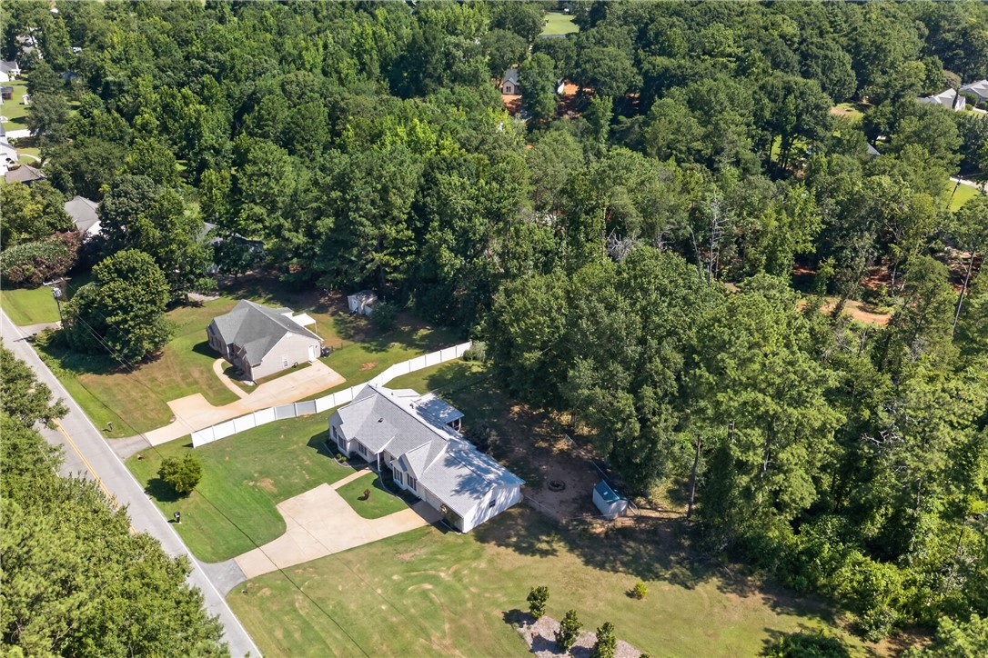 3336 Centerville Road Anderson, SC 29625 - Photo 46 of 50 An aerial perspective reveals a residence nestled within a verdant landscape with a private yard.