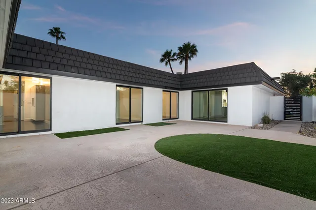 a view of a porch in front of house