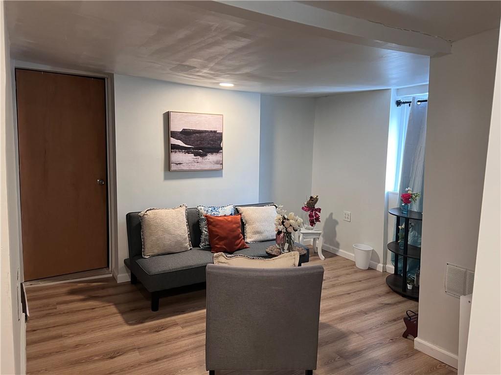 61 Pointview Road Pittsburgh, PA 15227 - Photo 4 of 12 a living room with furniture and a wooden floor