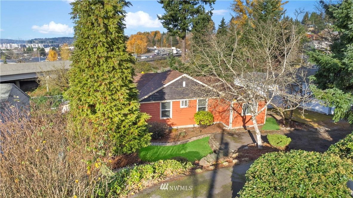 501 Grandey Way Northeast Renton, WA 98056 - Photo 3 of 40 an aerial view of a house with a yard swimming pool and outdoor seating
