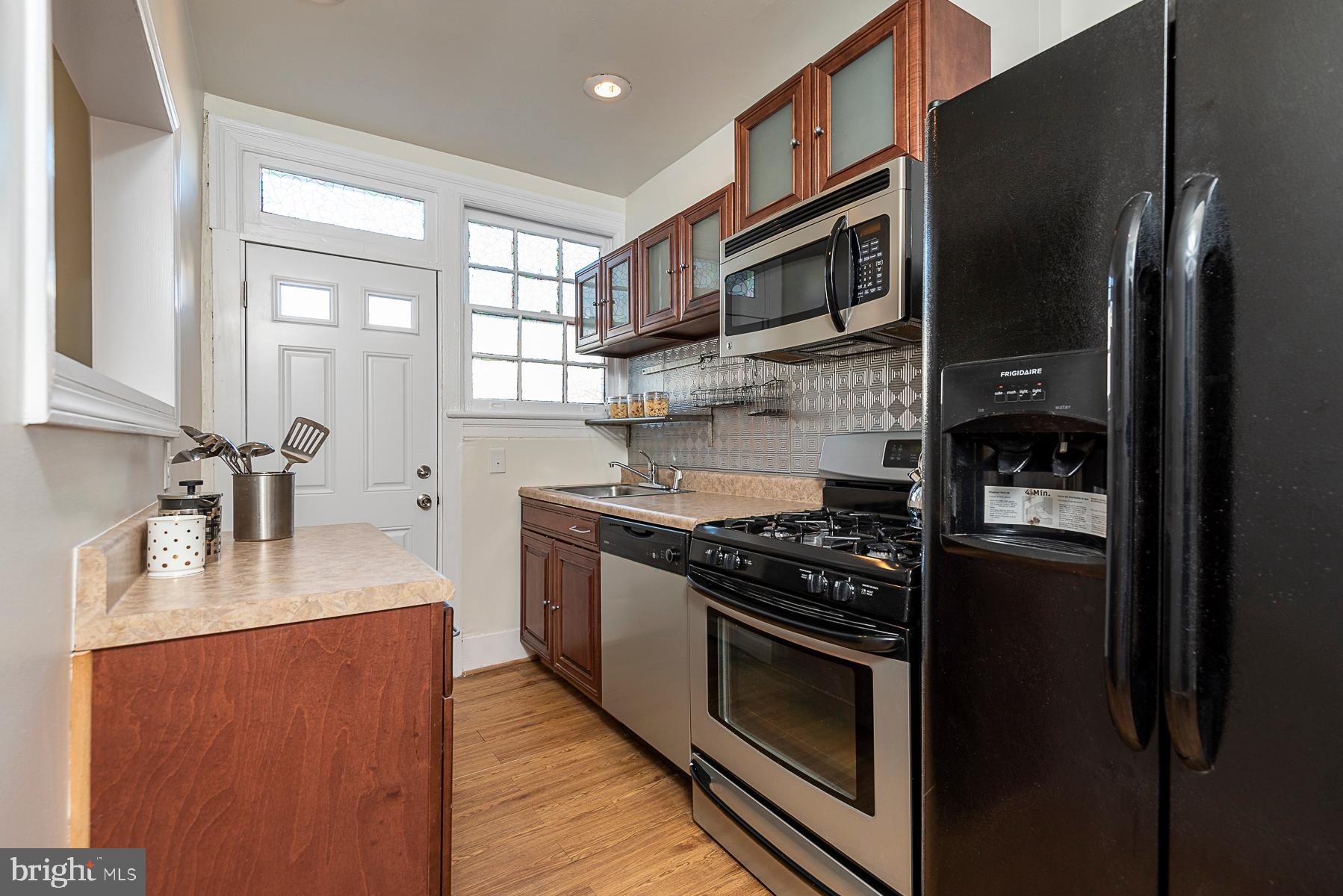437 Decatur Street Northwest Washington, DC 20011 - Photo 17 of 42 Kitchen - with view to rear door to patio and yard