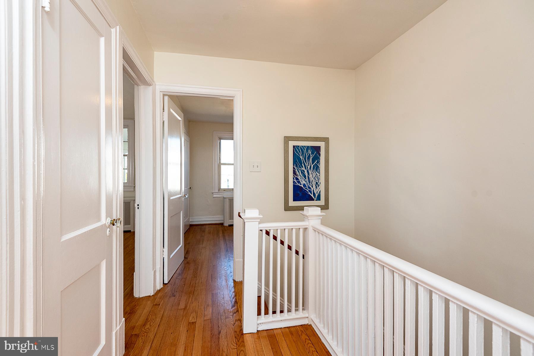 437 Decatur Street Northwest Washington, DC 20011 - Photo 21 of 42 Upstairs landing w/ hardwood floors