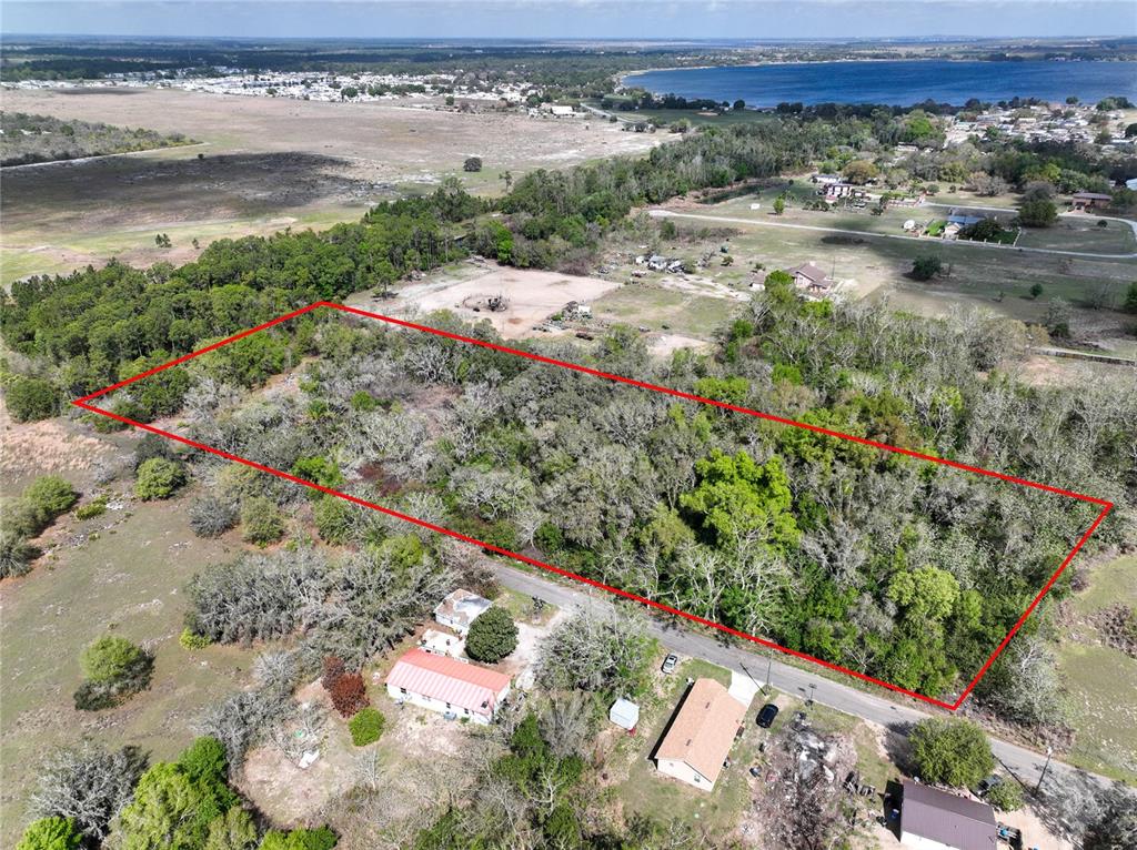 0 Tom Sheffield Road Frostproof, FL 33843 - Photo 3 of 23 a view of a lake with a mountain