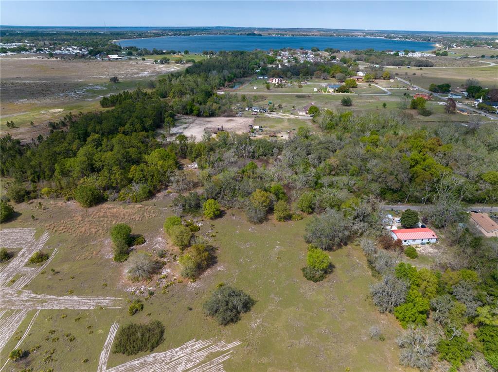 0 Tom Sheffield Road Frostproof, FL 33843 - Photo 8 of 23 a view of a lake with a mountain