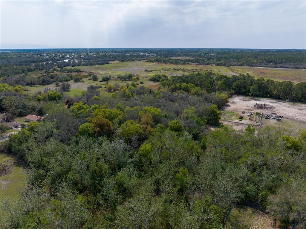 0 Tom Sheffield Road Frostproof, FL 33843 - Photo 10 of 23 an aerial view of a city and mountain view