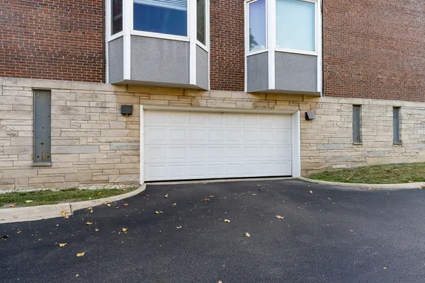 a view of a brick house with a street