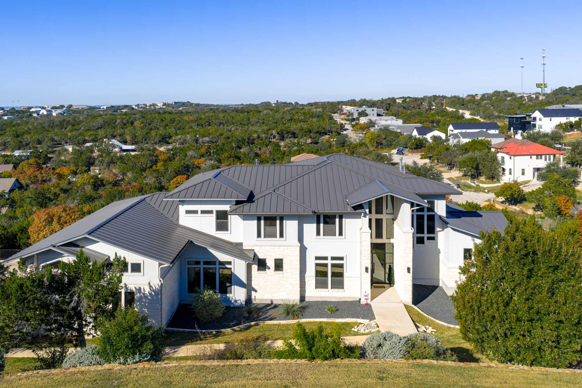 14900 Copper Ridge Lane Austin, TX 78734 - Photo 34 of 39 View of front facade featuring a metal roof