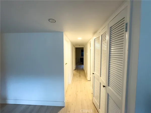 a view of a bathroom with a glass door