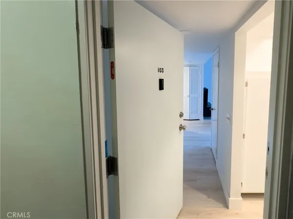 a view of a bathroom with a hallway