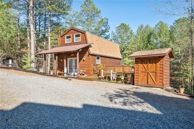 a living room with furniture fireplace and flat screen tv