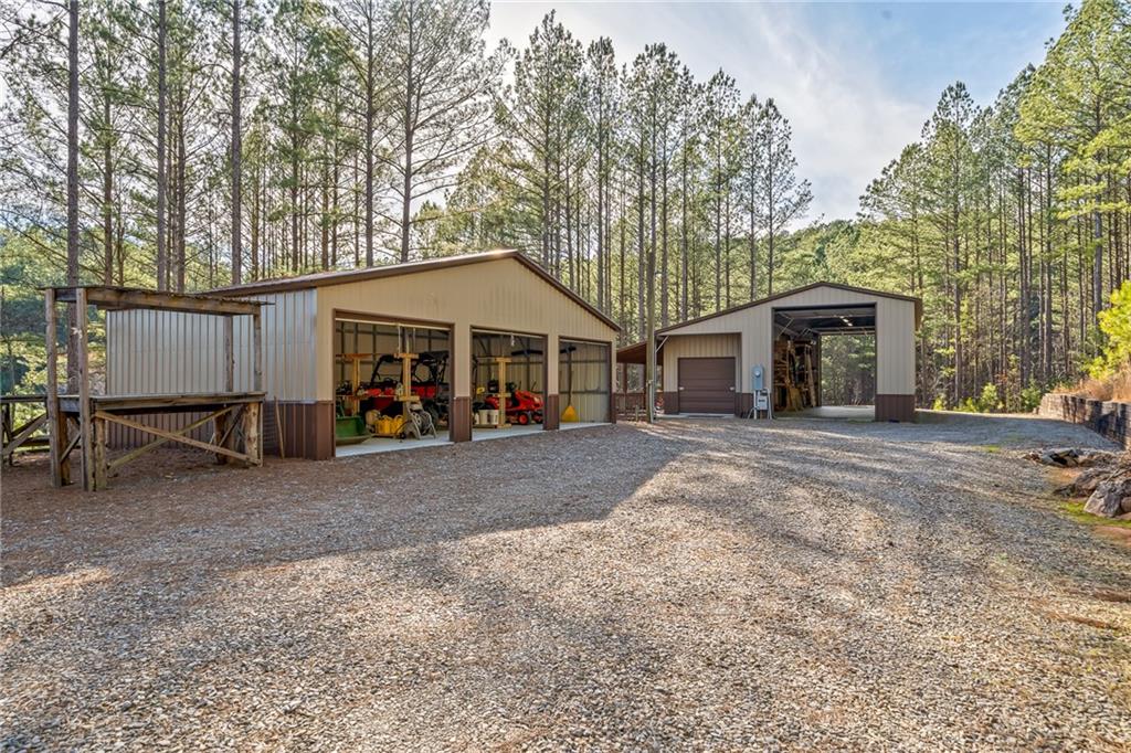 415 Kestrel Rdg Circle Murphy, NC 28906 - Photo 16 of 104 a view of a house with a yard and roof
