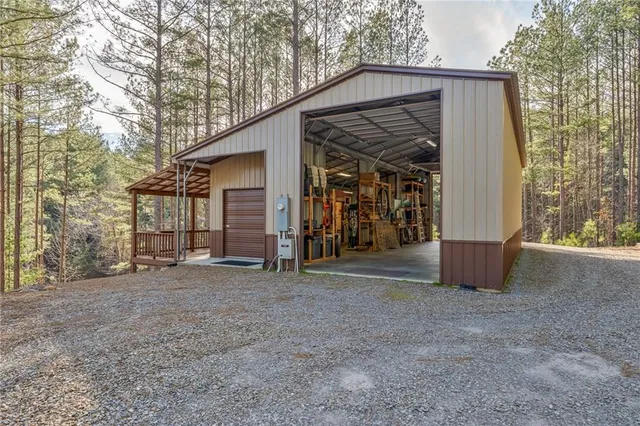 a view of front door with furniture and a window
