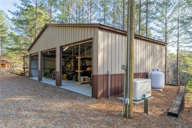 a view of a dining room with furniture window and outdoor view