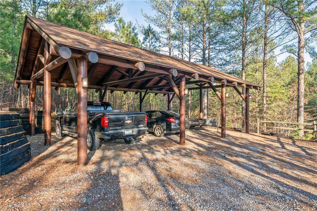 415 Kestrel Rdg Circle Murphy, NC 28906 - Photo 31 of 104 a view of outdoor space with table and chairs under an umbrella